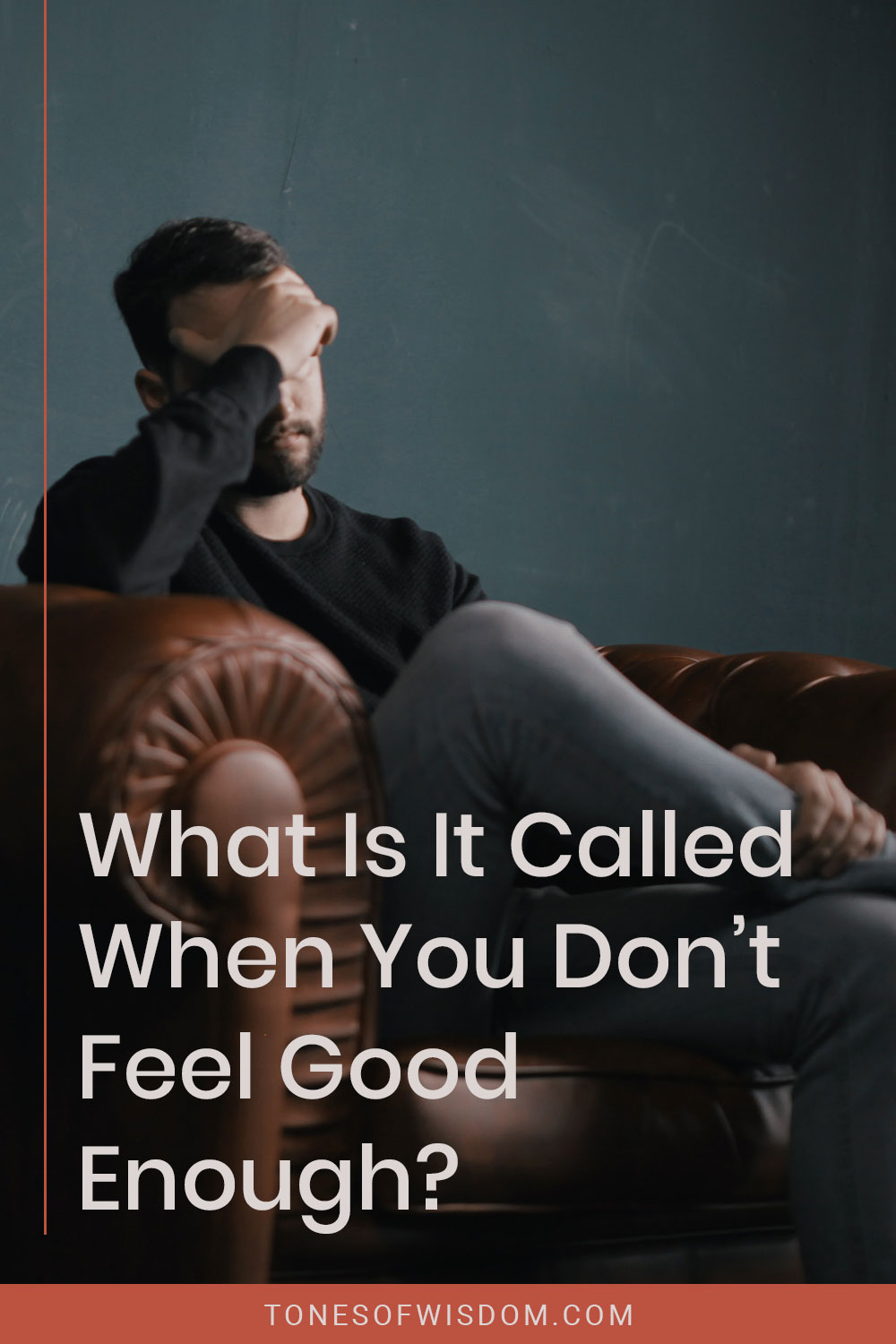 Tensed man sitting on a brown couch - What Is It Called When You Don’t Feel Good Enough?