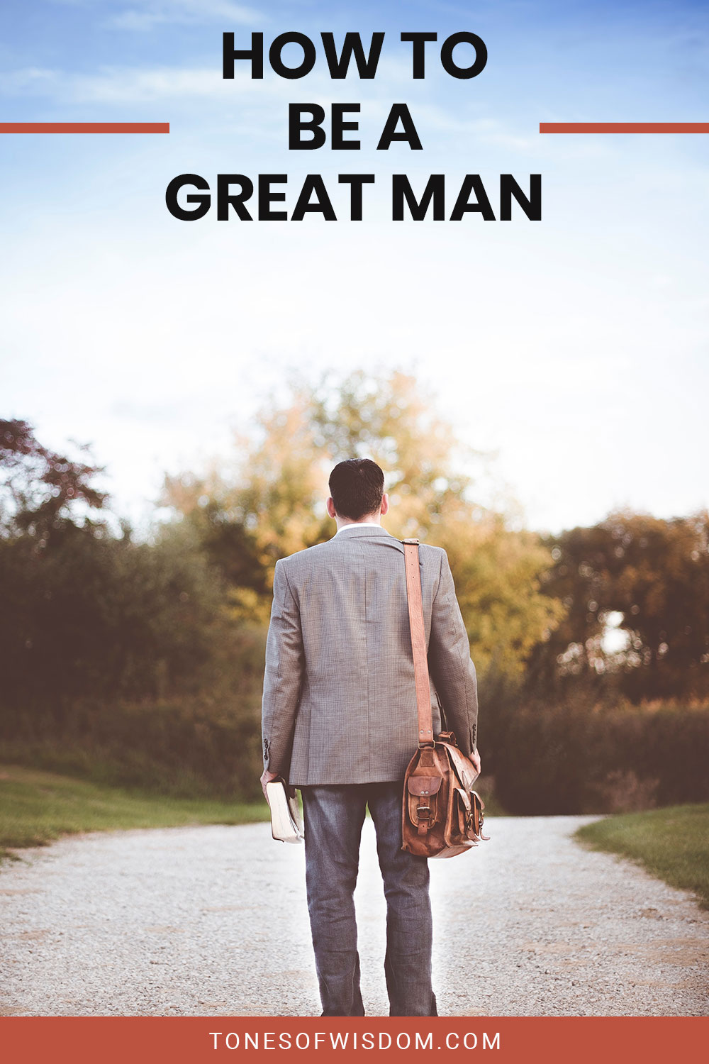 Man in grey suit and leather bag on his shoulder walking on a path - How To Be a Great Man?