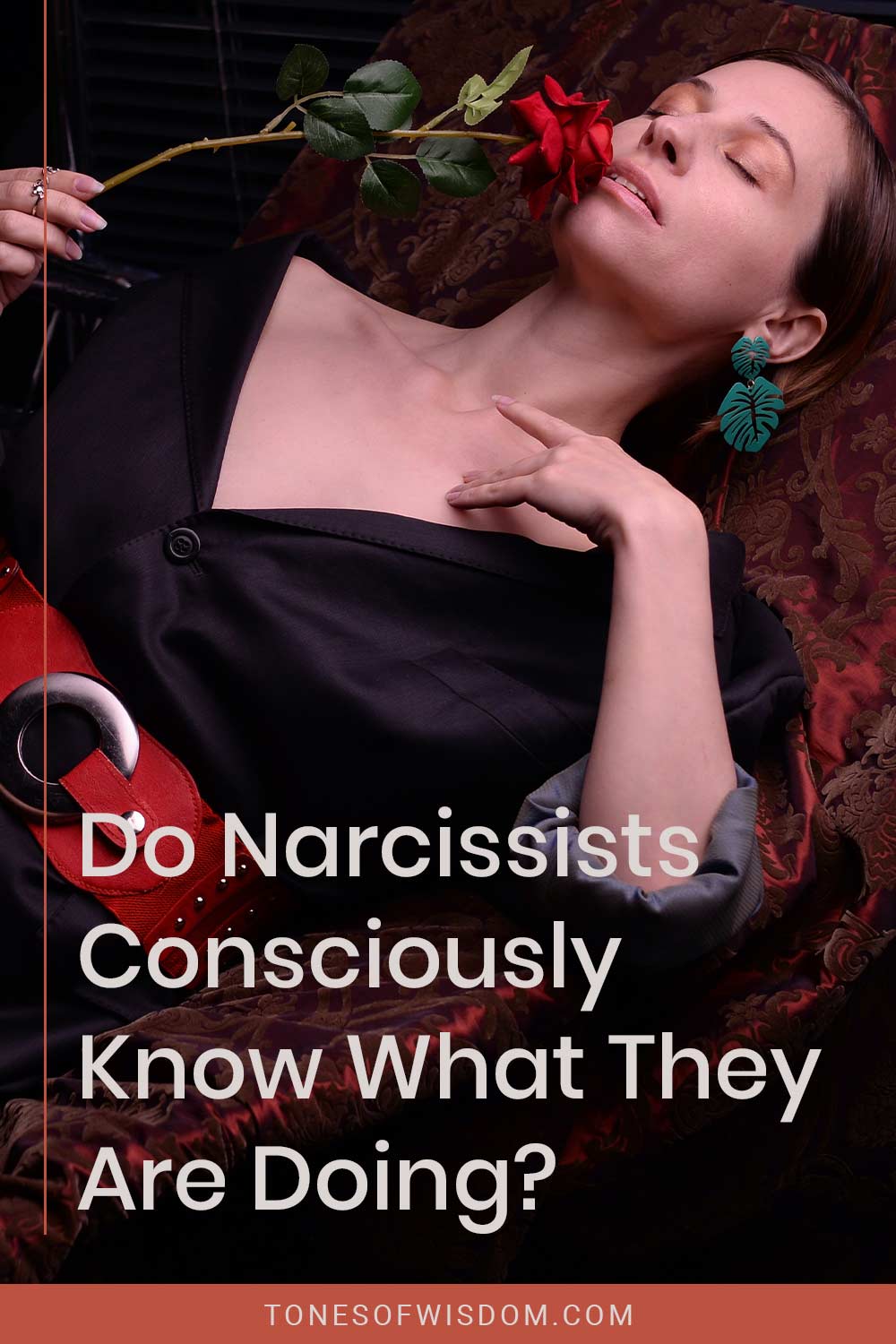 Woman in a black dress lying with a red rose in hand - Do Narcissists Consciously Know What They Are Doing?