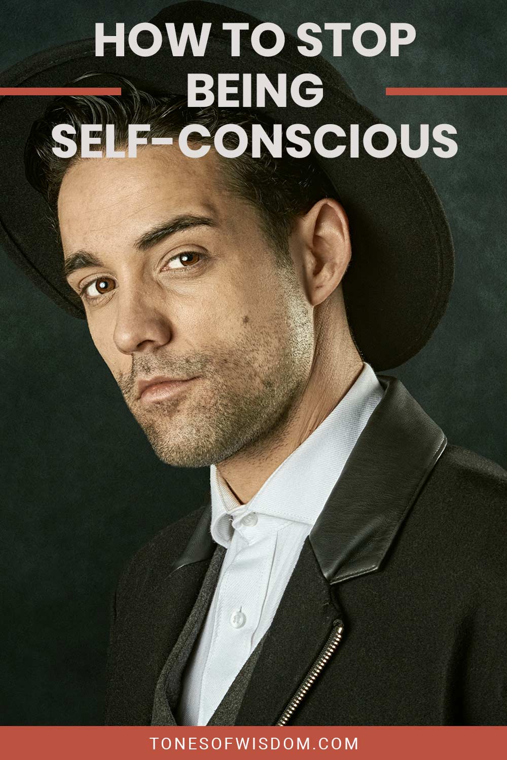 Man with a black hat on his head - How to Stop being Self-Conscious?